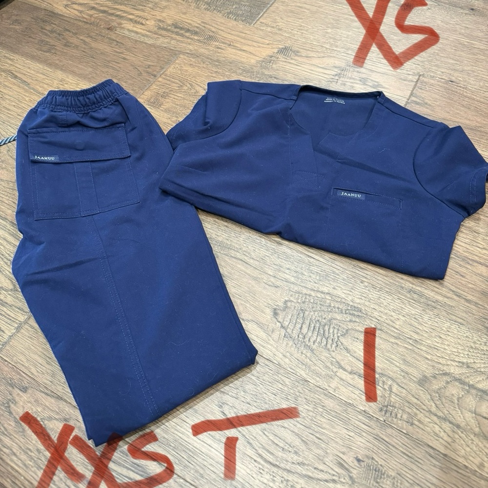 Jaanuu scrubs xs top, xxs tall jogger pants.